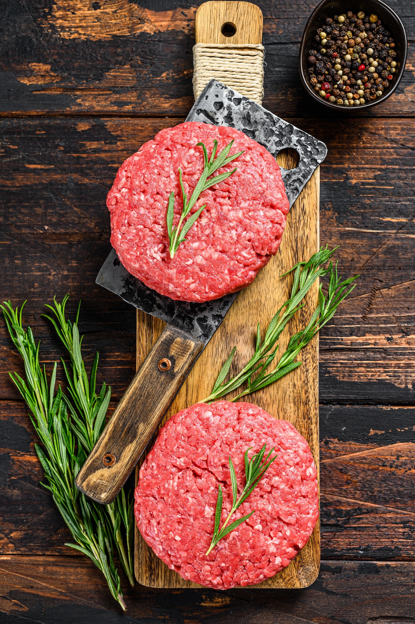 Ground raw meat patties. Meat cutlet ready to cook. Farm organic meat.